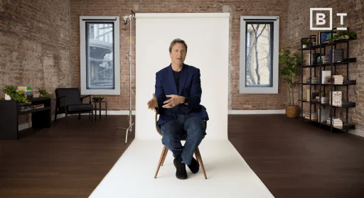 A man sitting in a chair.