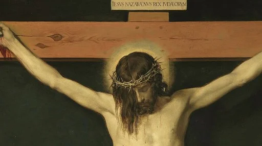 Painting depicting a man with a crown of thorns, arms outstretched on a wooden cross, with a sign above his head that reads "Iesus Nazarenus Rex Iudaeorum.